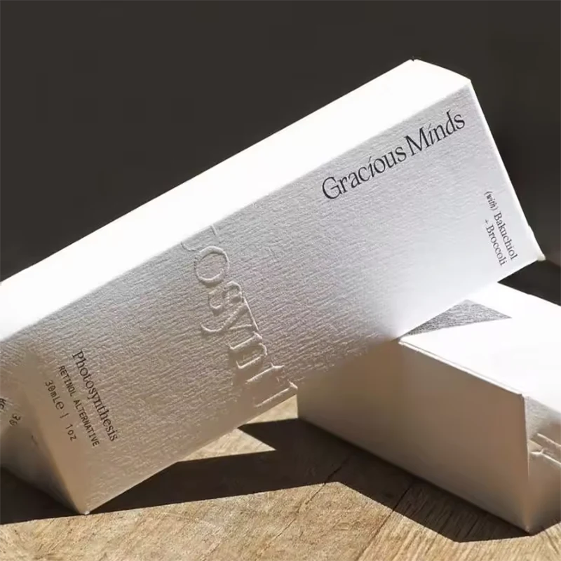 Lógó cabhraithe Bosca Pacáistithe Tuck Top